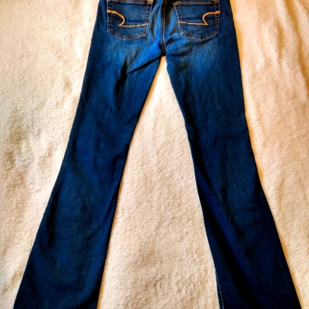 1 pair of American Eagle blue jeans
